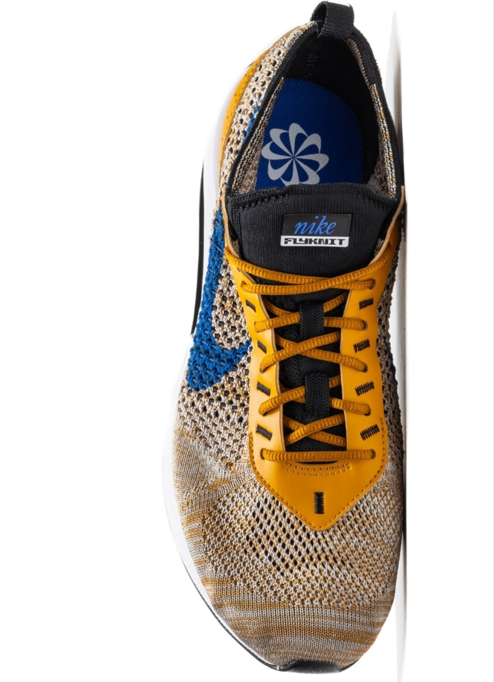 Nike Flyknit Runner with Blue Swoosh and Tan Accents